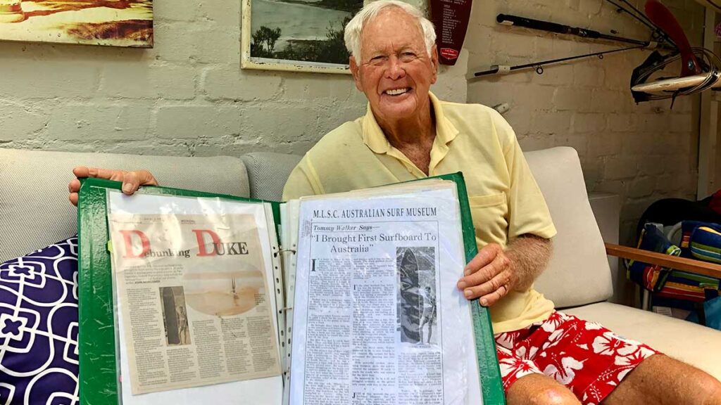 Ray Moran with his scrapbook for Tommy "Looney" Walker