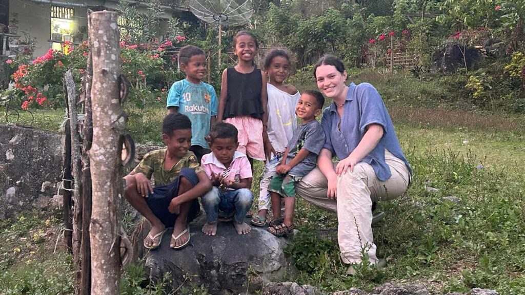 Former Maria Regina student Isabeau with Soibada Village kids